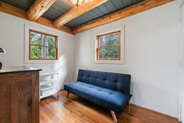 114 Fort Rd, Edgecomb, ME 04556 - living area featuring wooden ceiling, beamed ceiling, and light wood finished floors