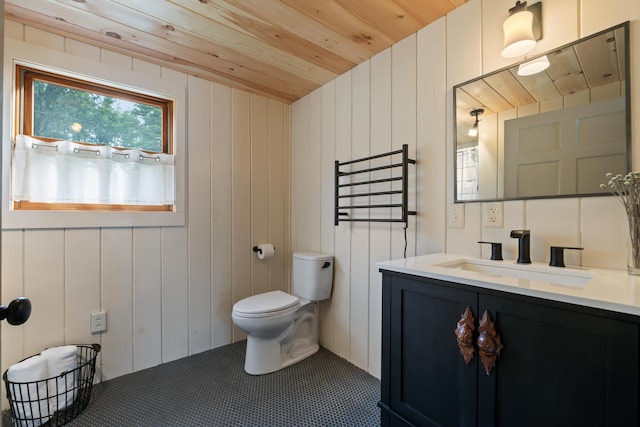 114 Fort Rd, Edgecomb, ME 04556 - bathroom with toilet, wooden ceiling, and vanity