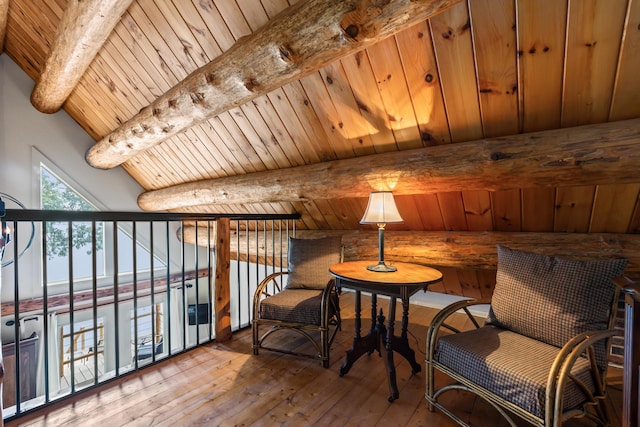 114 Fort Rd, Edgecomb, ME 04556 - living area with vaulted ceiling with beams, wood-type flooring, and wooden ceiling
