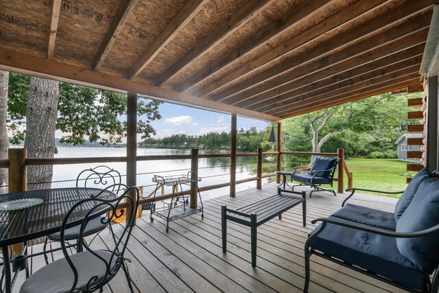 wooden terrace with a water view