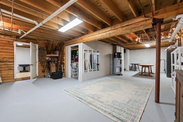 114 Fort Rd, Edgecomb, ME 04556 - unfinished basement featuring water heater