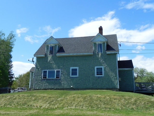 view of home's exterior featuring a lawn