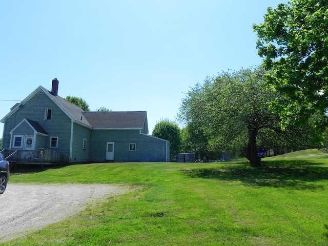 exterior space with a yard