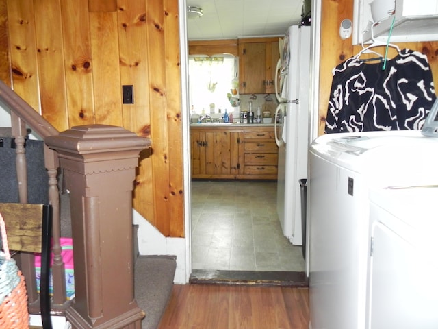 laundry area featuring sink and washer / dryer