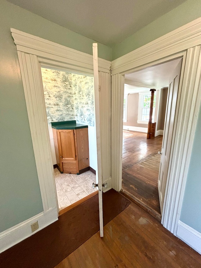 hallway with light hardwood / wood-style flooring