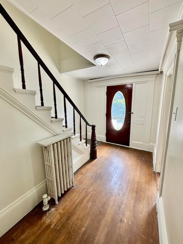 foyer entrance featuring hardwood / wood-style flooring