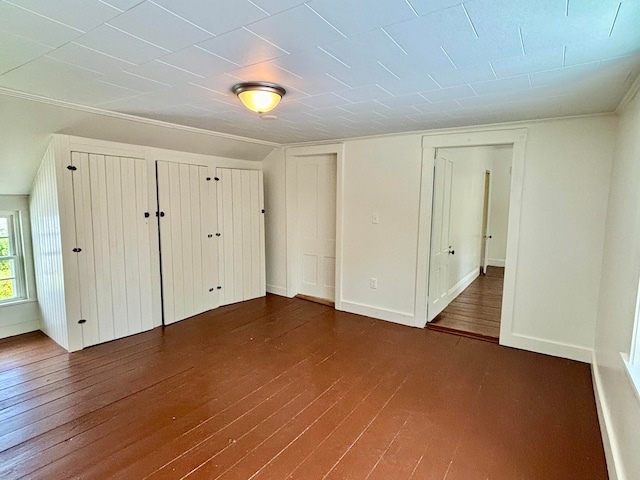 unfurnished bedroom featuring hardwood / wood-style flooring