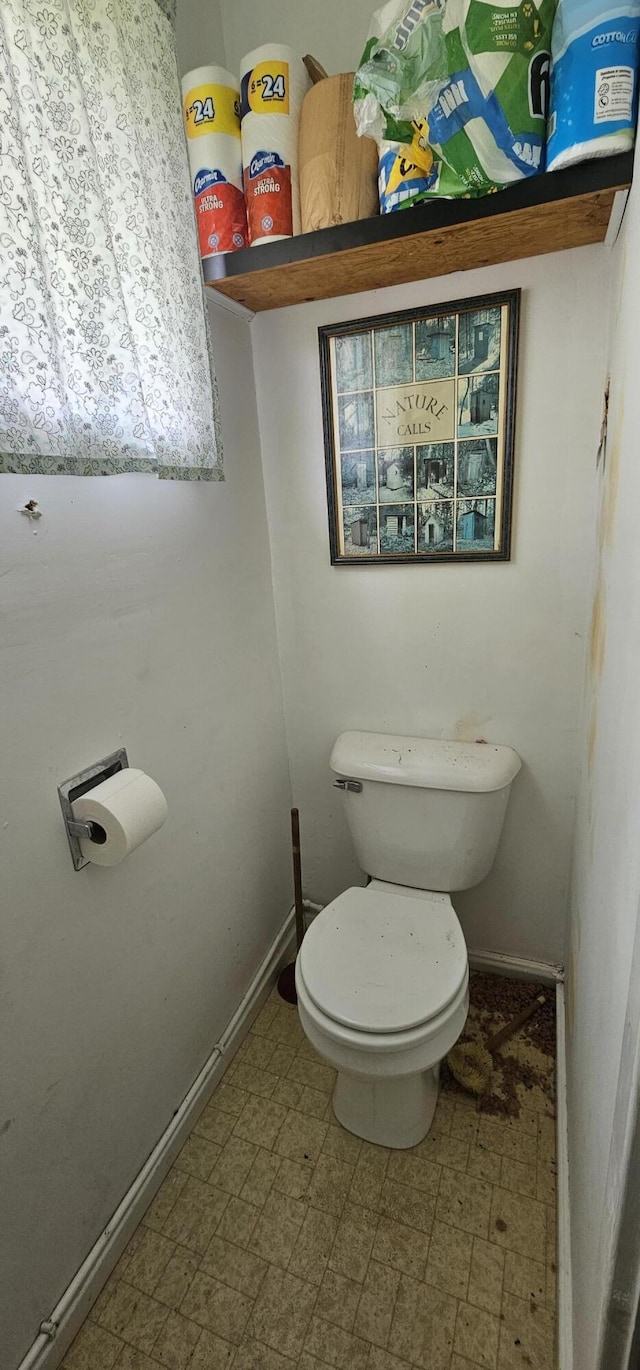 457 Porter Nadeau Rd, Eustis, ME 04936 - bathroom with toilet and tile patterned floors