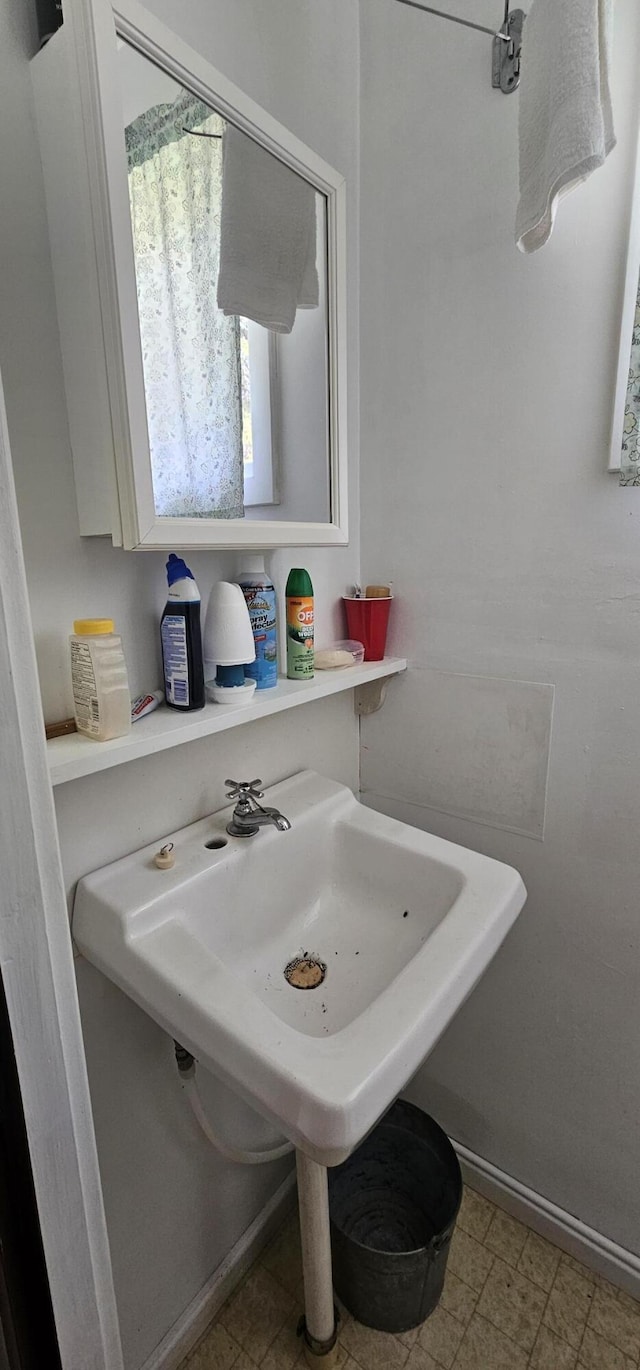 457 Porter Nadeau Rd, Eustis, ME 04936 - bathroom featuring baseboards