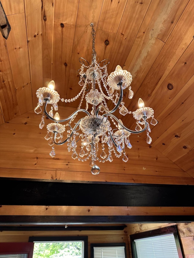 interior details with wood ceiling and an inviting chandelier