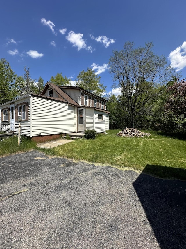 exterior space with a lawn