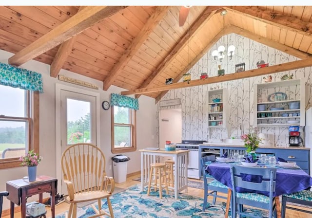 interior space featuring an inviting chandelier, wood ceiling, and vaulted ceiling with beams