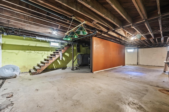 basement with stairs and heating fuel