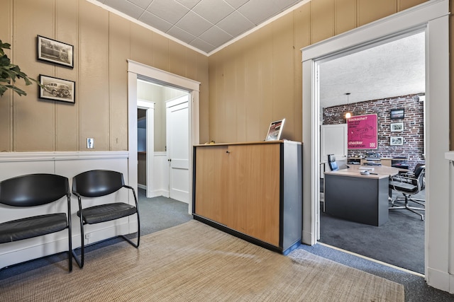 interior space featuring carpet floors and crown molding