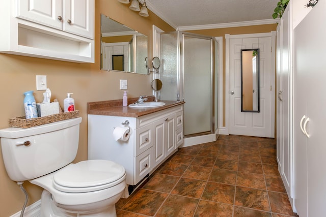 bathroom with toilet, an enclosed shower, a textured ceiling, ornamental molding, and vanity