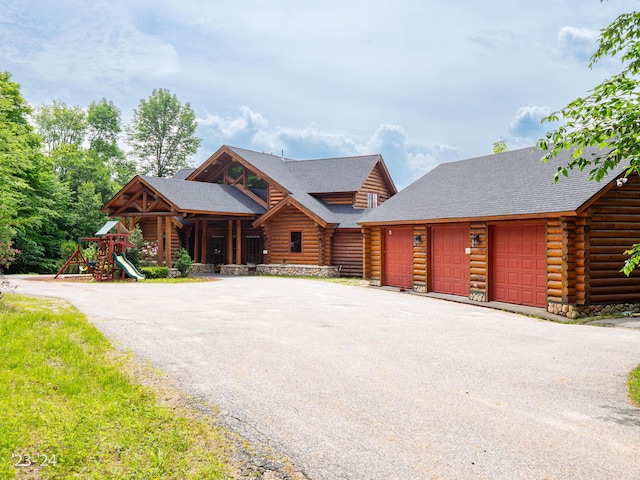 log home with a garage