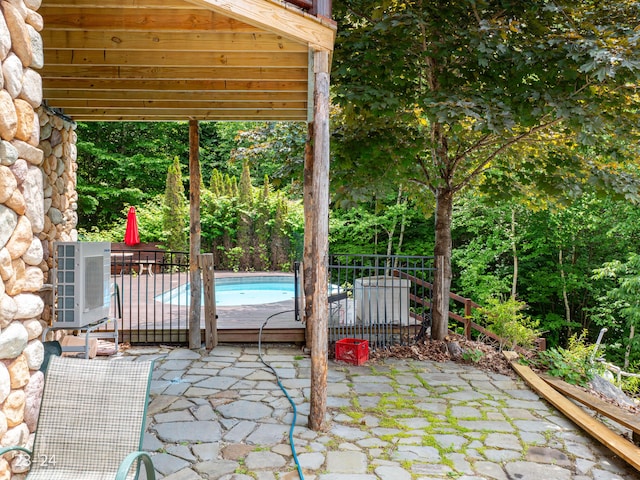 view of patio / terrace featuring a fenced in pool