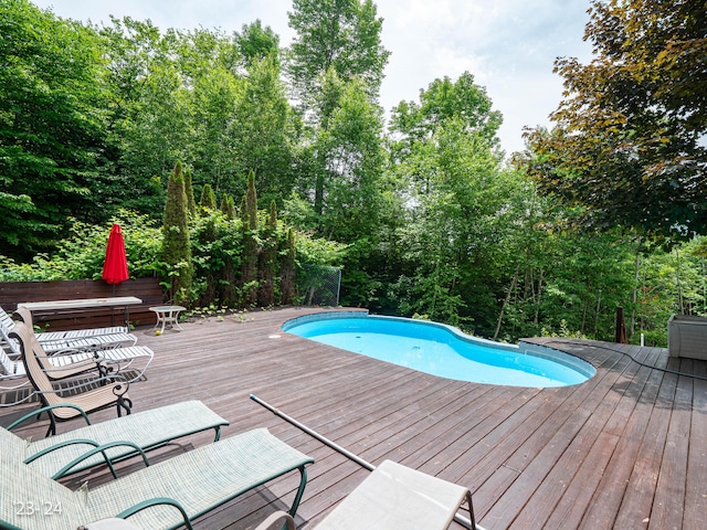 view of pool featuring a wooden deck