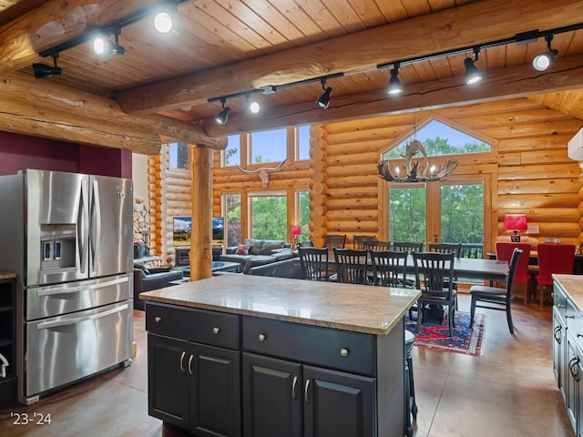 kitchen featuring log walls, stainless steel fridge with ice dispenser, a center island, and wooden ceiling