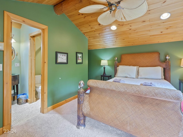 carpeted bedroom featuring ensuite bath, ceiling fan, lofted ceiling, and wood ceiling