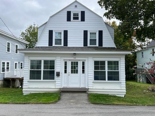 view of front of property with a front lawn