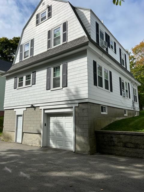 exterior space with a garage