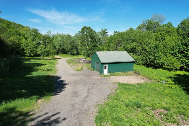 view of outdoor structure with a garage