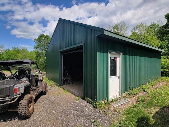 view of outbuilding with a garage