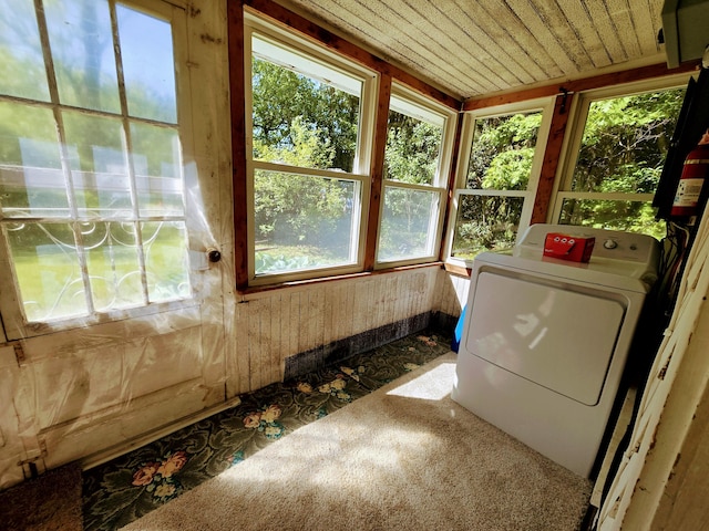 laundry room featuring laundry area, washer / clothes dryer, and wood ceiling