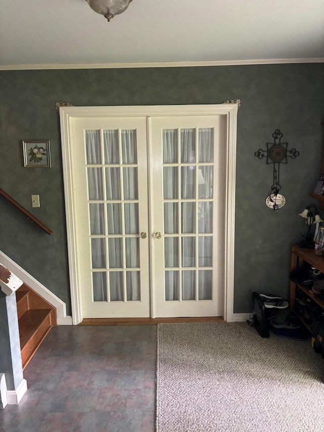 doorway to outside featuring french doors and crown molding