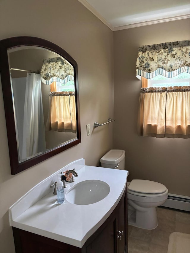 bathroom featuring ornamental molding, vanity, a baseboard heating unit, toilet, and tile patterned floors