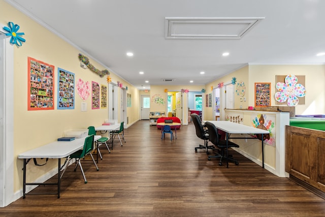 office featuring dark hardwood / wood-style flooring and ornamental molding