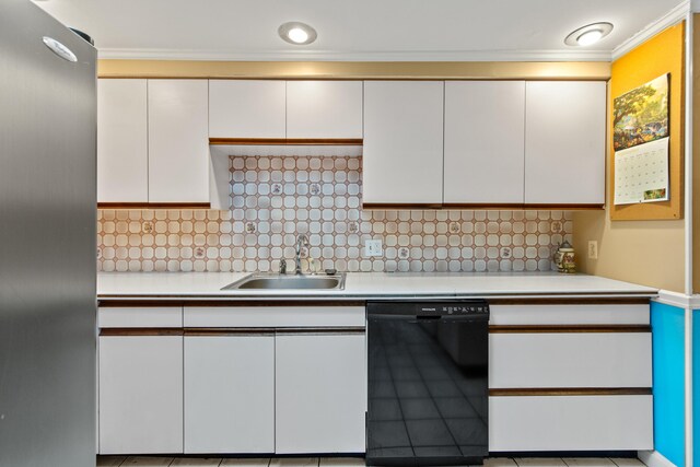 kitchen with dishwasher, sink, white cabinetry, and tasteful backsplash