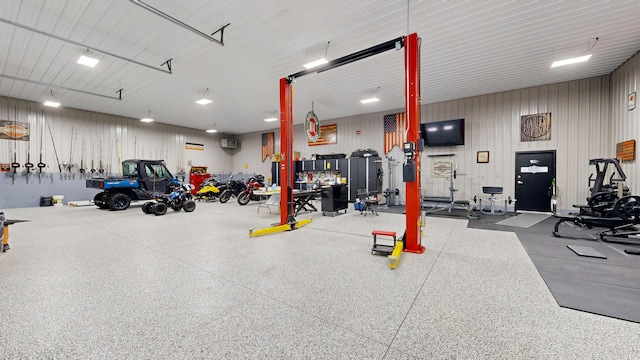 gym featuring a high ceiling