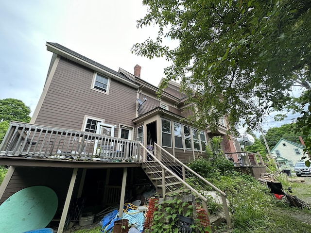 rear view of house with a deck