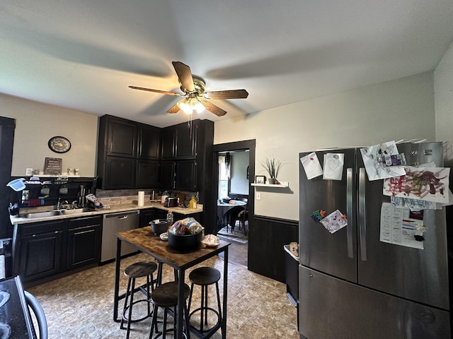 kitchen featuring sink, ceiling fan, and appliances with stainless steel finishes