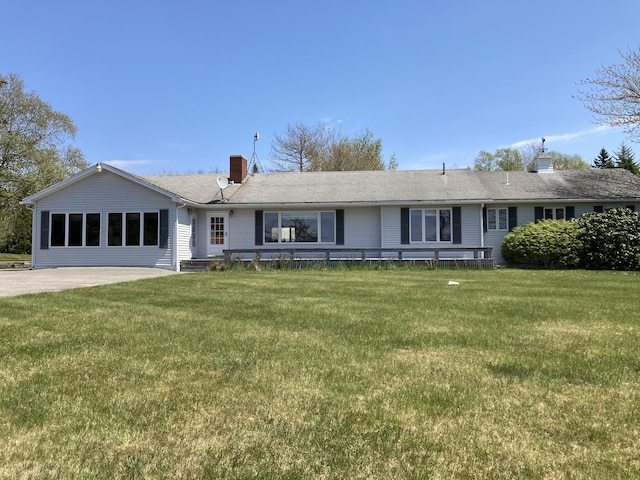 view of front of property with a front lawn