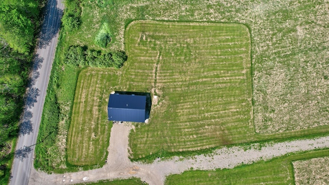 birds eye view of property featuring a rural view