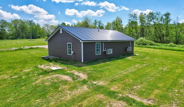 view of home's exterior featuring a yard