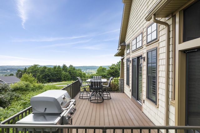 wooden deck with area for grilling