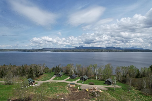 bird's eye view with a water and mountain view