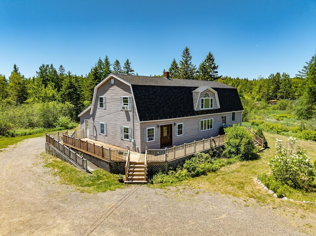 view of front of house featuring a deck