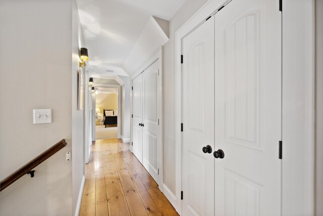 corridor featuring light hardwood / wood-style floors