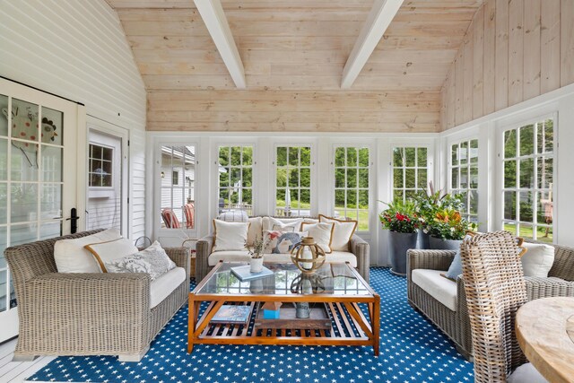 sunroom / solarium with lofted ceiling with beams and wooden ceiling