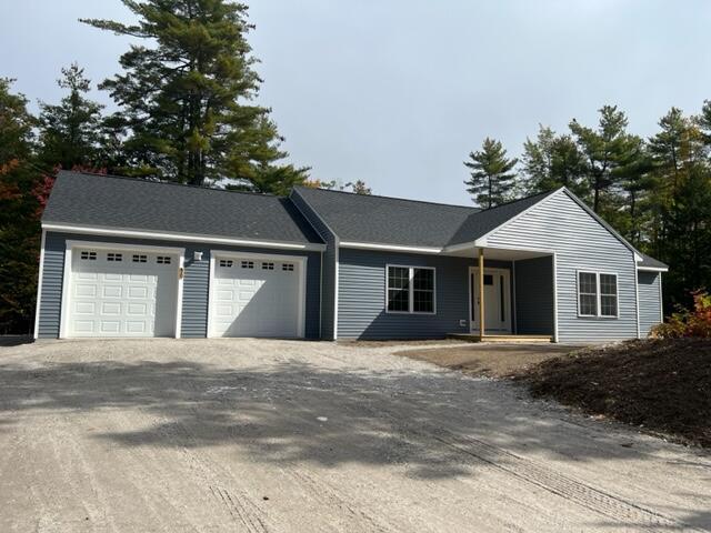 single story home with a garage