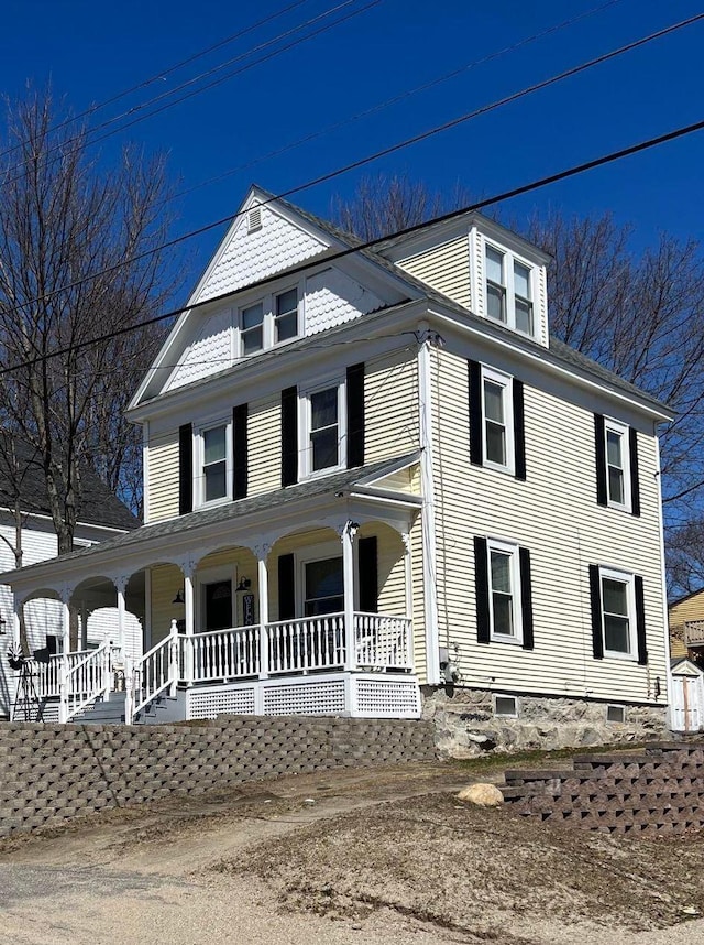 view of front of home featuring covered porch