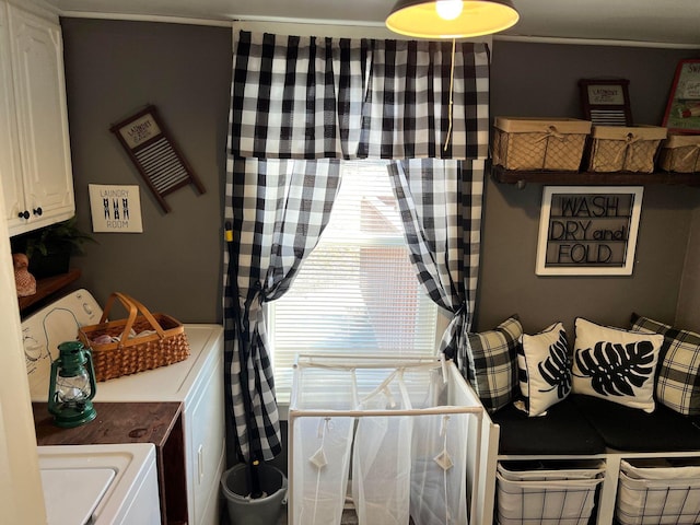 interior space with washer and dryer, cabinets, and a wealth of natural light