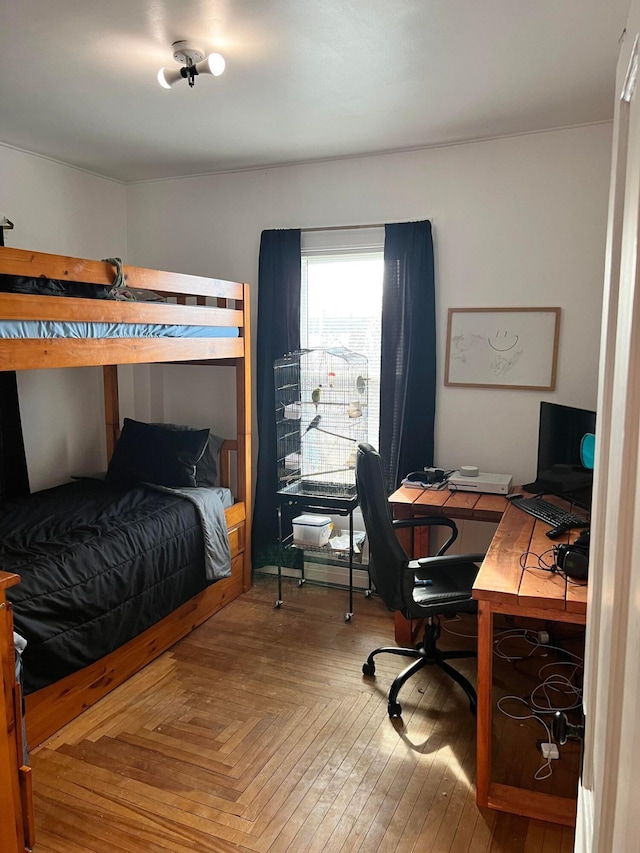 bedroom featuring parquet floors