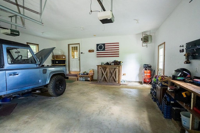 garage featuring a garage door opener