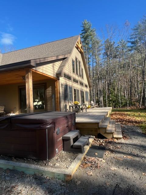 view of patio / terrace featuring a hot tub